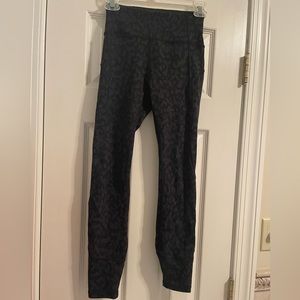 Lululemon leggings in Camo Leopard black/gray. Size 4. Like new.